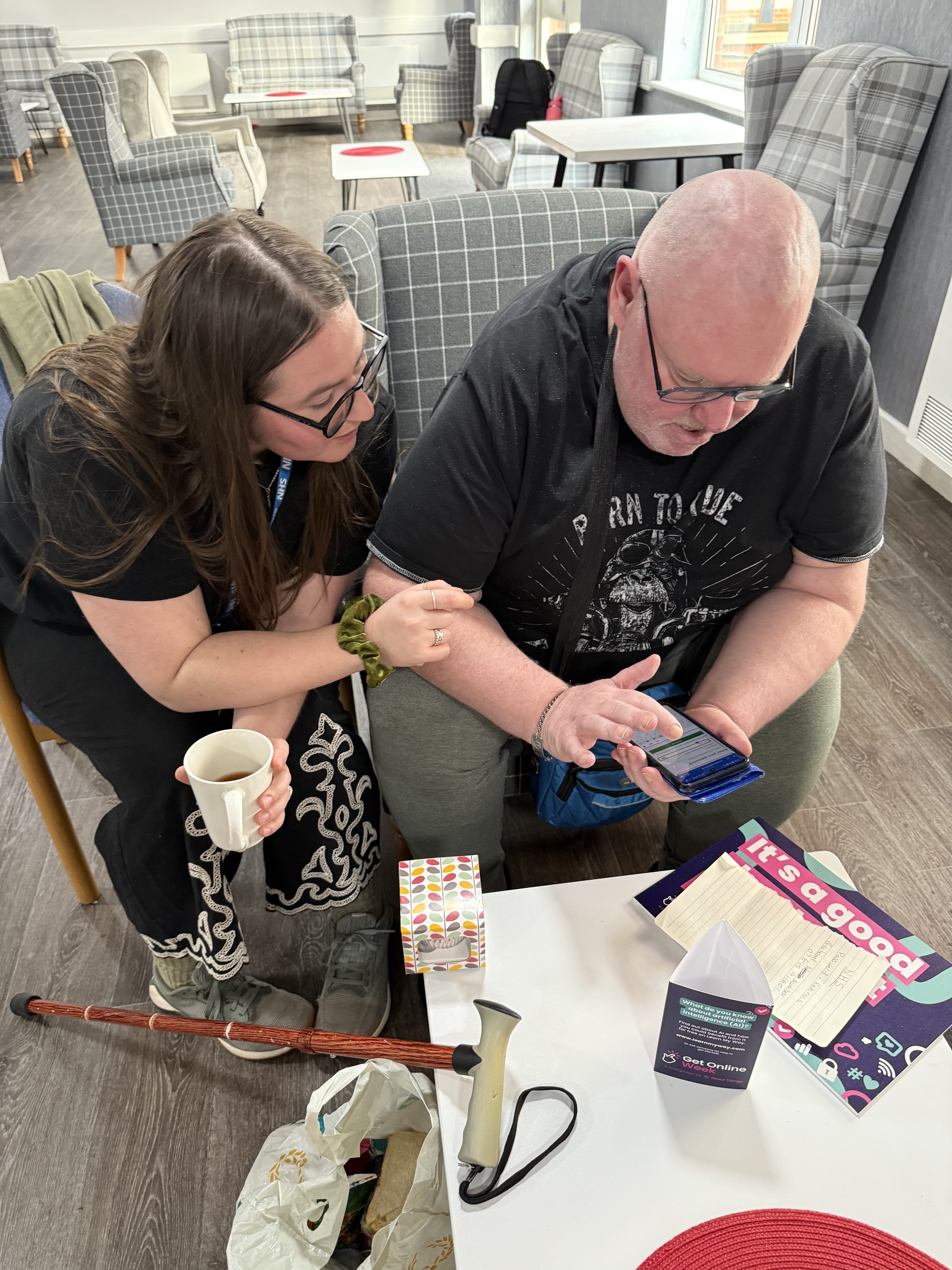 A resident receiving digital inclusion support in the community
