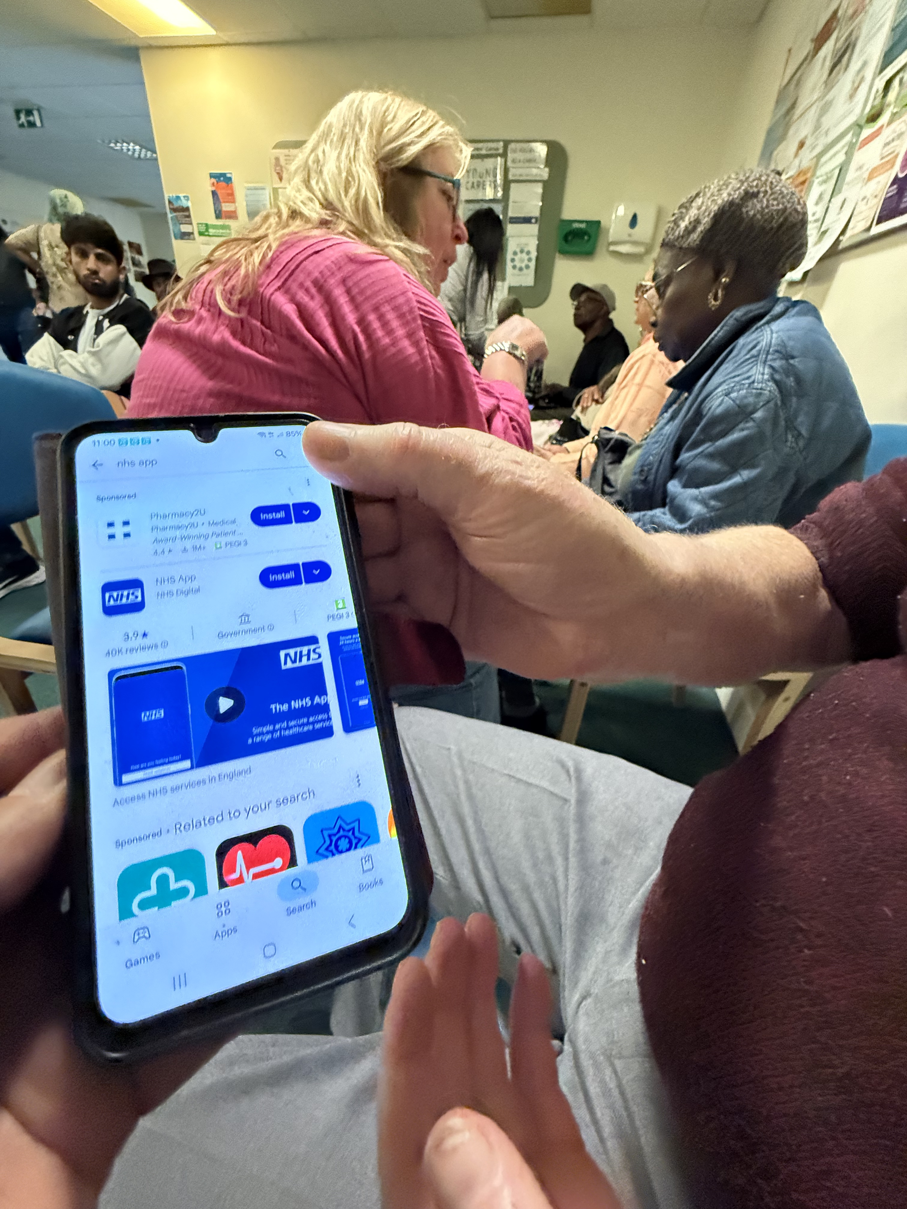 A resident being supported with the NHS App